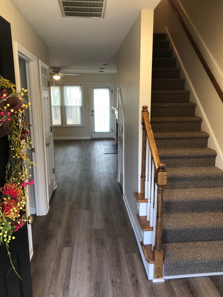open door welcomes you into your newly renovated townhome.
