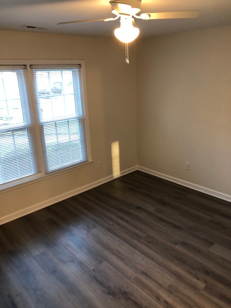 You can customize your main level bedroom with an area rug.